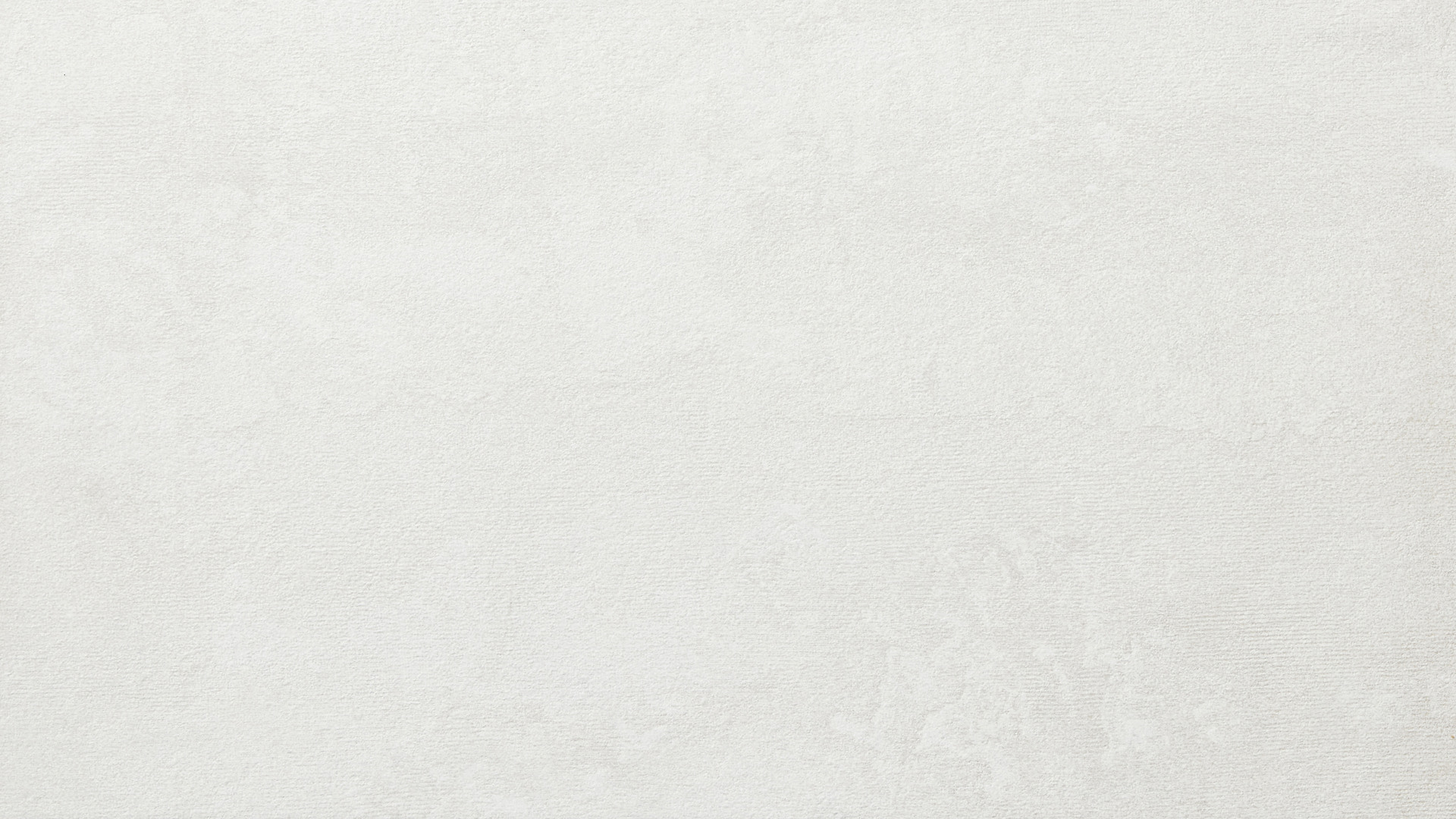 En vit fyrkantig kakelplatta på en vit bakgrund.